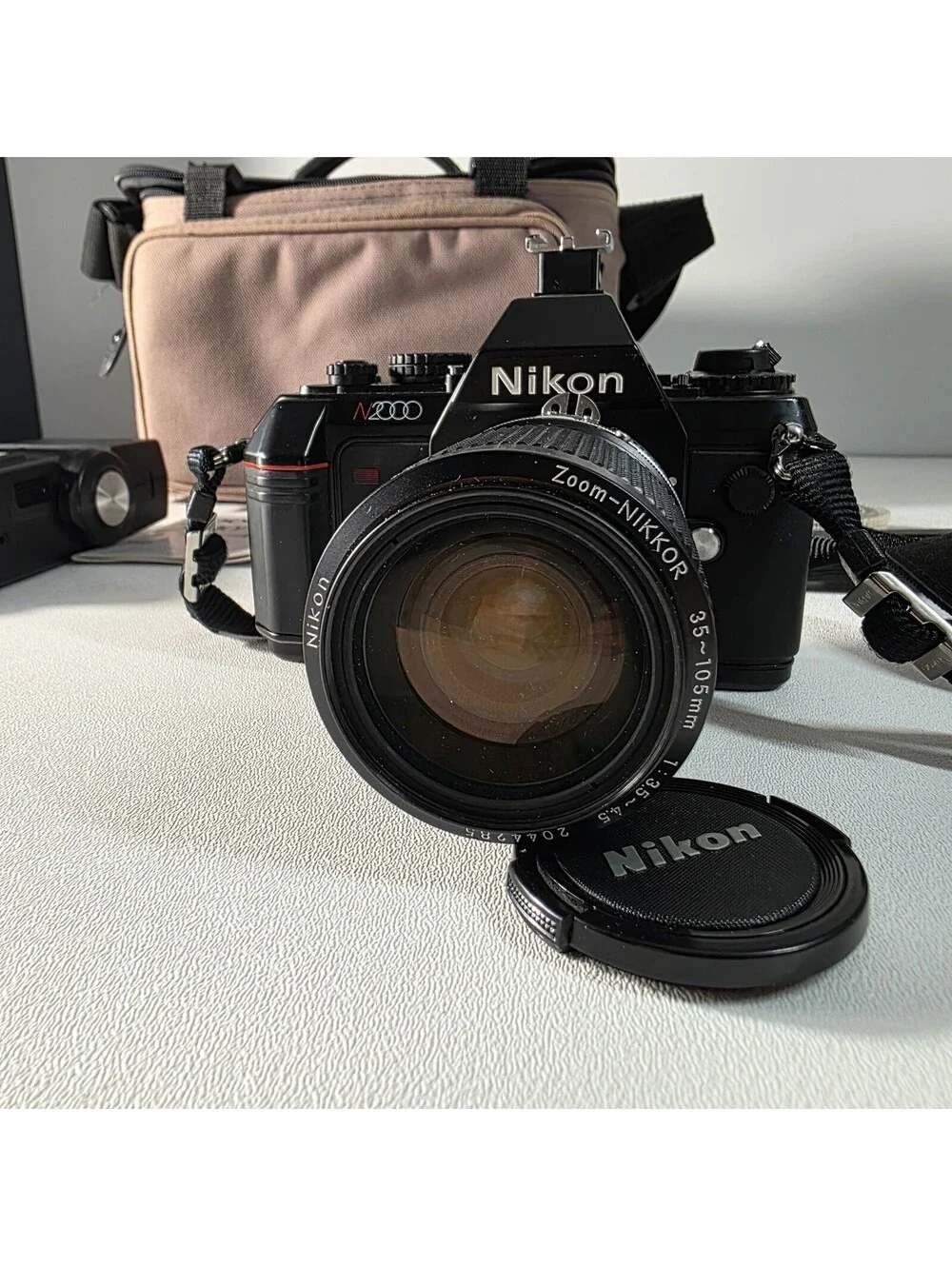 Nikon N2000 35mm Film Camera w/ Nikon Nikkor 35-105mm f3.5-4.5 Zoom Lens Bundle